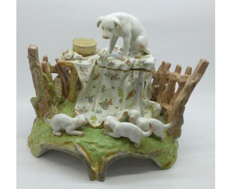 A continental figural inkwell 
