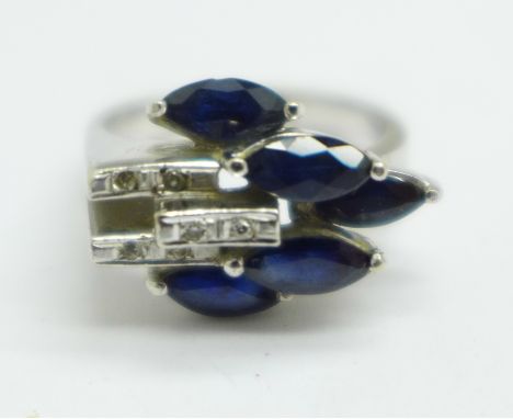 An 18ct white gold, sapphire and diamond Art Deco style ring, faint 18k mark, 5.8g, N 