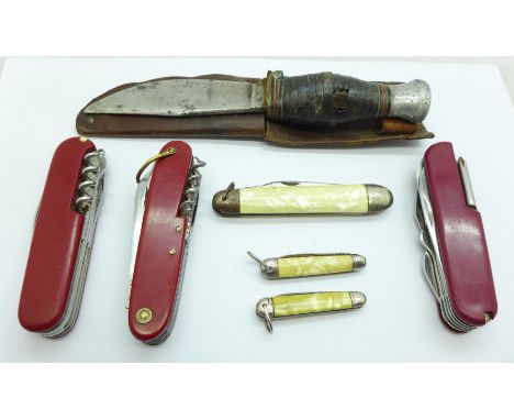 Three Swiss Army knives, a WWII Army knife and three others 