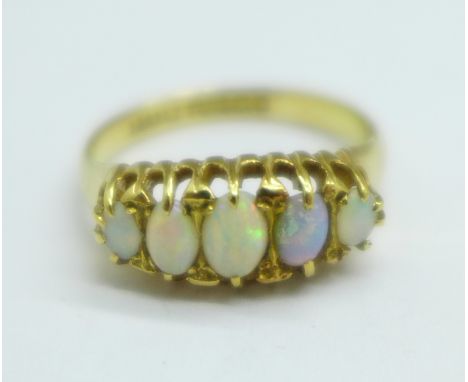 An 18ct gold and five stone opal ring, Birmingham 1925, 3.8g, Q 