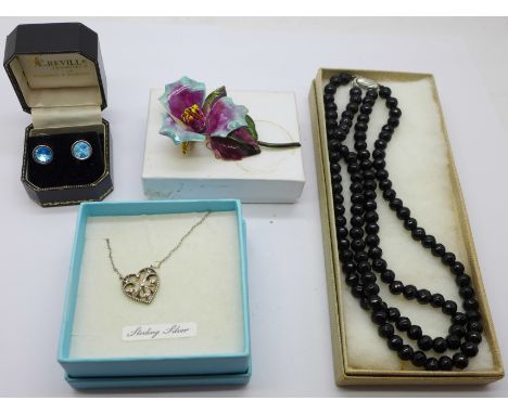 A silver mounted black glass bead necklace, signed enamel brooch, Swarovski earrings and a silver pendant 
