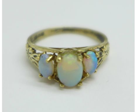 A 9ct gold, three stone opal ring, a/f, small chip on centre stone, one other stone reset, 2.1g, N 