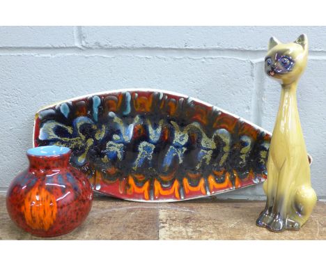 A Jema lustre cat, a modern Poole vase and a Poole 'spear' dish, dish a/f, chipped and stained 