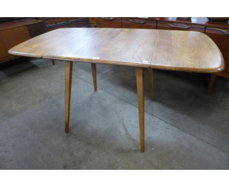 An Ercol drop-leaf table