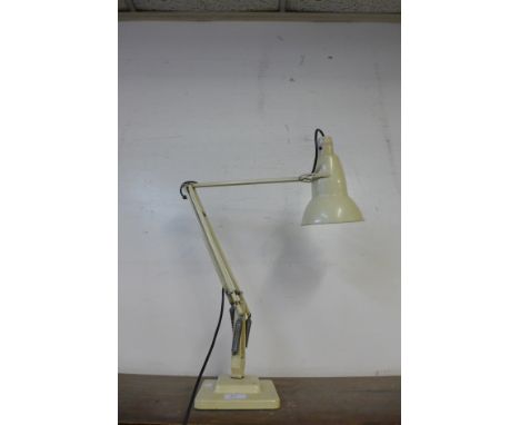 A cream anglepoise lamp