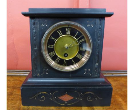 A 19th Century French Belge noir mantel clock