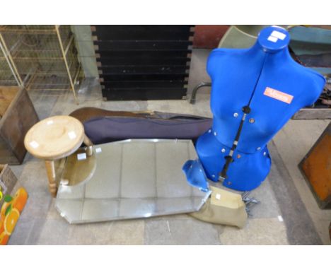 A mirror, milking stool, half mannequin, violin case and one other