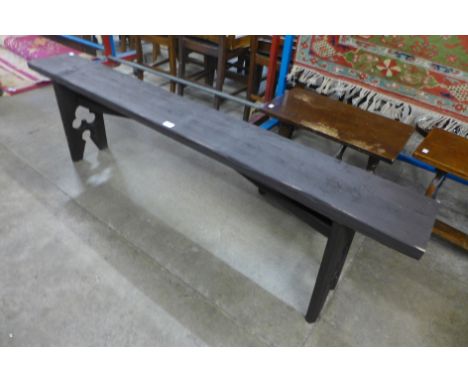 A stained pine bench