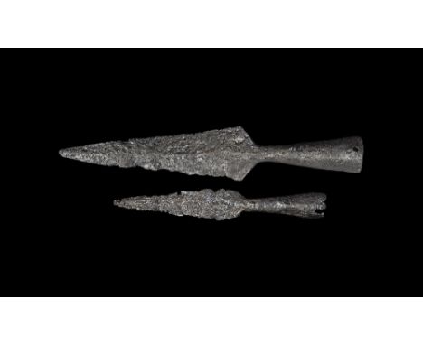 9th-11th century AD. A pair of iron spearheads, each with flared socket, triangular lentoid-section blade. From a private col