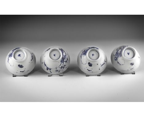 Kangxi Period, Late 17th century AD. A group of four blue and white glazed ceramic tea bowls with flower, bird and insect dec