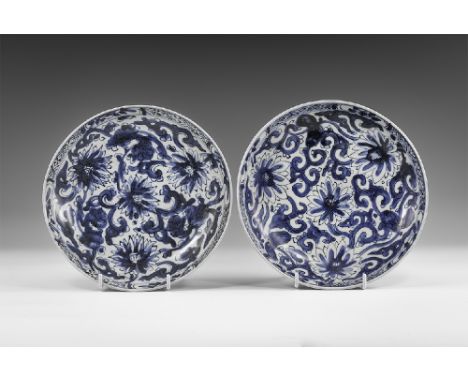 Kangxi Period, Late 17th century AD. A pair of blue and white glazed ceramic dishes with chrysanthemum decoration. From the '