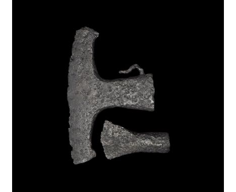 2nd century BC-1st century AD. A mixed pair of iron tools comprising: a woodworking axehead with flared blade, split socket; 