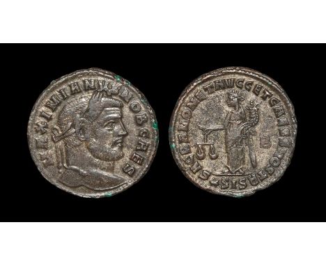 300 AD. Siscia mint. Obv: MAXIMIANVS NOB CAES legend with laureate head right. Rev: SACRA MONET AVGG ET CAESS NOSTR legend wi