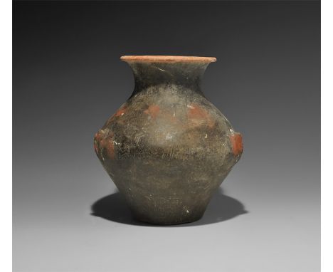 Neolithic period, 3rd millennium BC. A squat ceramic vase with broad body, sharply everted rim, three flanges to the shoulder