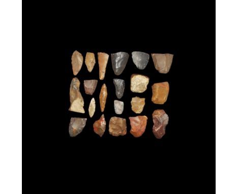 Neolithic, 5th-3rd millennium BC. Group comprising: four bifacial knapped leaf arrowheads, one of slightly asymmetric form; a