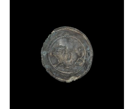1st-2nd century AD. A domed discoid silver phalera with ropework border, central panel with ropework border and repoussé imag