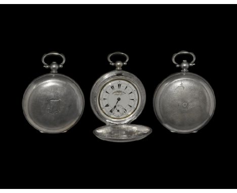 19th century AD. A silver pocket watch with guilloche pattern and central shield device on the front cover, guilloche pattern