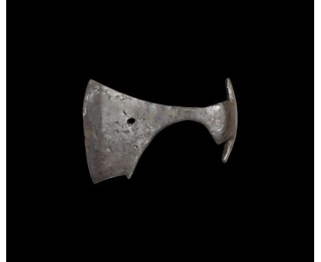 9th-11th century AD. An iron axehead with triangular-section narrow blade widening to a broad bevelled edge with square chin 