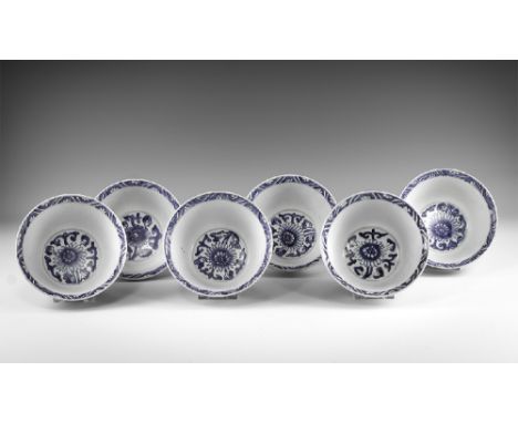 Kangxi Period, Late 17th century AD. A group of four blue and white glazed ceramic bowls with chrysanthemum decoration. From 