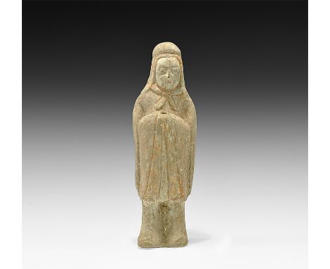 Northern Qi Dynasty, 550-577 AD. A hollow-formed ceramic figure of a standing robed male with hood and open-fronted mantle, b