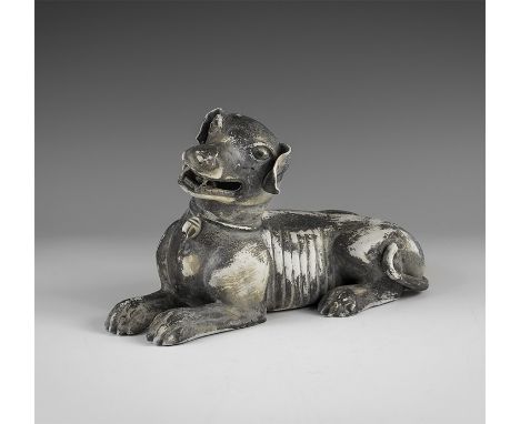 Kangxi Period, Late 17th century AD. A hollow-formed grey glazed ceramic dog figurine with open mouth, green glazed collar wi