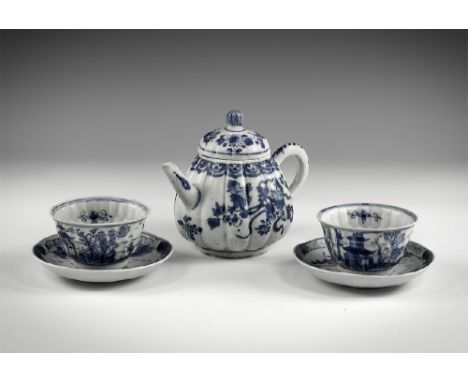 Kangxi Period, Late 17th century AD. A group of blue and white glazed ceramic items comprising: a teapot and domed lid with s