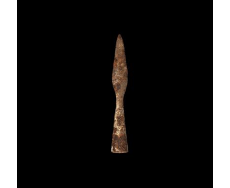 9th-11th century AD. A small iron spearhead with lentoid-section leaf-shaped blade, short neck, long flared closed socket wit