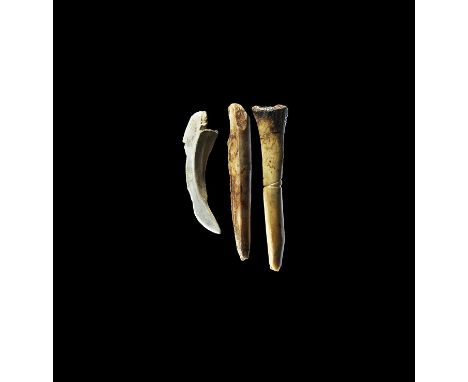 Neolithic, 5th-3rd millennium BC. Group comprising: two awls formed from animal leg bones, one with incised circumferential l