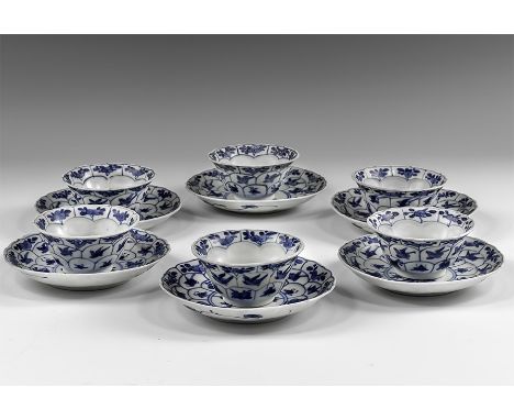 Kangxi Period, Late 17th century AD. A group of six blue and white glazed ceramic lotus bowls with barbed rim and six matchin