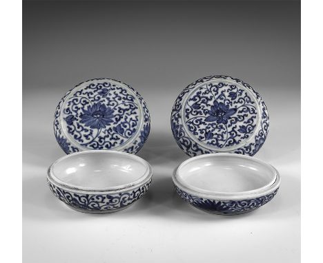 Kangxi Period, Late 17th century AD. A pair of blue and white glazed ceramic squat containers with chrysanthemum motif and sc