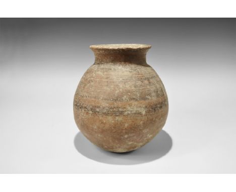 3300-1700 BC. A substantial ceramic jar with flared rim, painted band to the shoulder with ladder and geometric motifs. From 