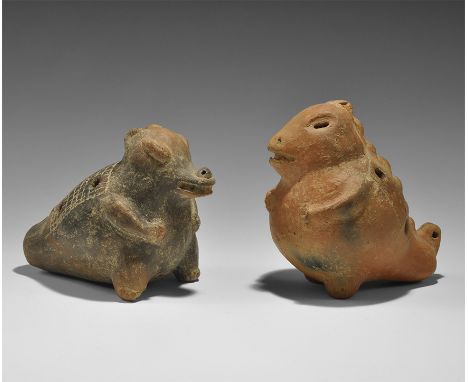 1st millennium AD. A pair of ceramic vessel flutes comprising: a burnished red lizard with holes to the tail, eyes, back and 