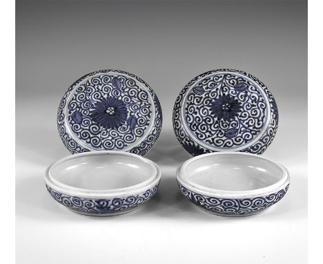 Kangxi Period, Late 17th century AD. A pair of blue and white glazed ceramic squat containers with chrysanthemum motif and sc