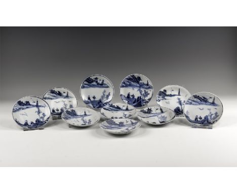 Kangxi Period, Late 17th century AD. A group of ten blue and white glazed ceramic saucers with scenes including figures in a 