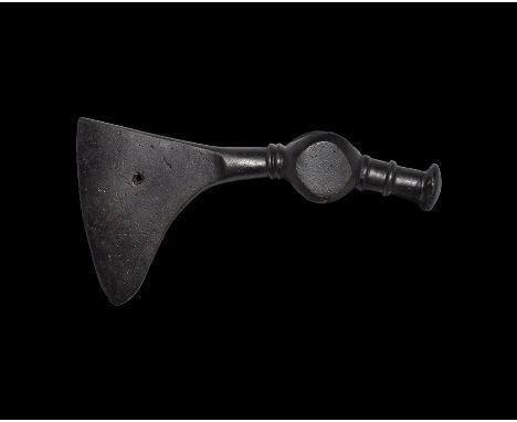 9th-11th century AD. A hand-forged iron axe-hammer comprising a triangular-section blade with swept edge, hole to the centre,