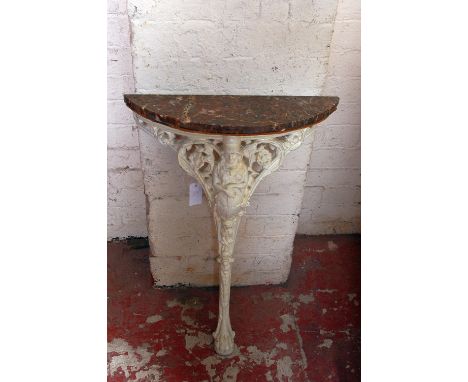 A marble topped console table.