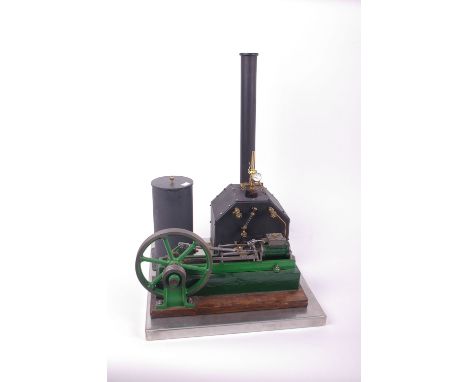 A  steam plant, built by Mr M. Combe  of Bristol, consisting of a spirit-fired upright boiler with fittings including sight g