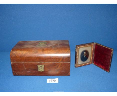 A wooden jewellery box with brass escutcheons with a lift out tray and a daguerreotype photograph in leather case.