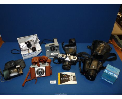A quantity of Cameras and accessories including Olympus Accura Zoom 8GS (a/f), manual and box, Olympus TRIP AF 30, Fujica STX