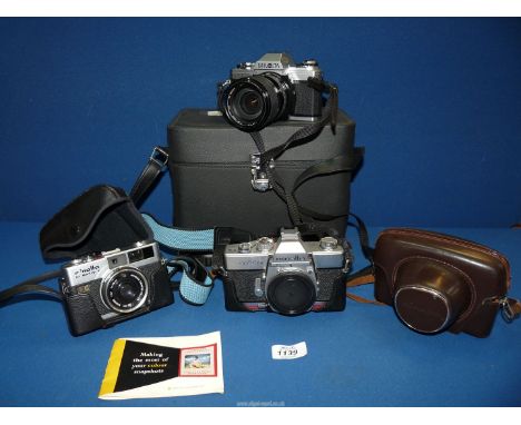 A Minolta X300 Camera with case, lens and flash, HiMatic F with case, SRT 101 and Uniomat camera and case.