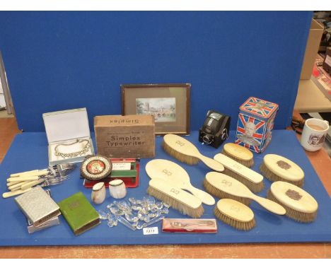 A quantity of miscellaneous to include: a Model A Simplex typewriter, dressing table set, two Post Office saving banks, Ensig