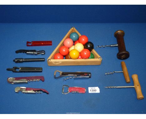 A small quantity of corkscrews, snooker balls and triangle.
