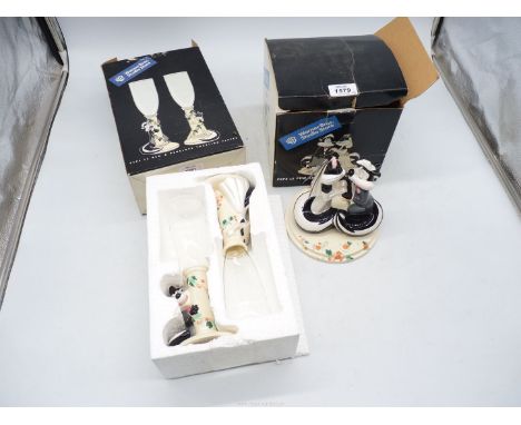 A Warner Brothers Pepe-Le-Pew cake topper and toasting flutes.
