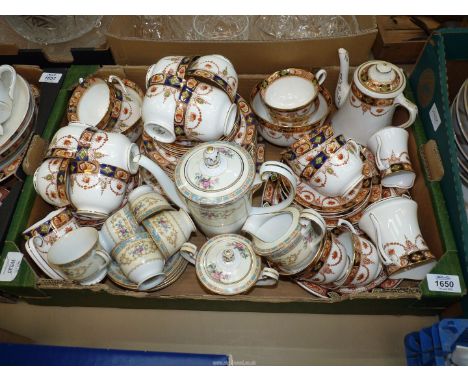 Three part teasets to include "Gladstone " blue, green and gold comprising twelve cups, saucers, side plates, bread and butte