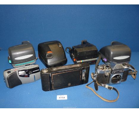 A box of Polaroid cameras, etc. to include: Polaroid 600 extreme.
