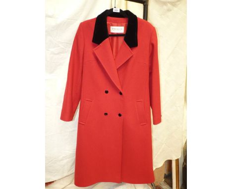 A ladies Windsmoor pure wool Coat in red with black velvet collar, black button fastening, half belt and deep single vent, si