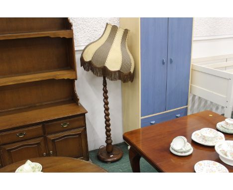 Oak standard lamp with barley twist column and tasselled brown shade