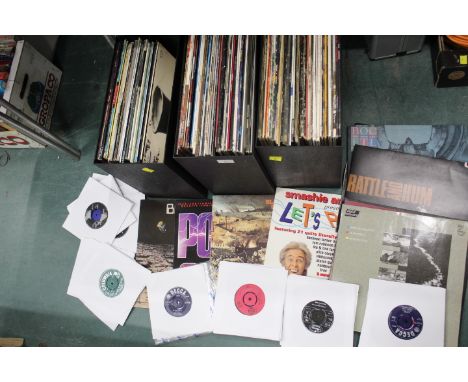 Three boxes of LP's, Michael Jackson Bad, Meatloaf, Genesis, The House Martins, Zee Zee Top etc 