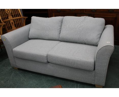 Light blue two seater sofa bed 