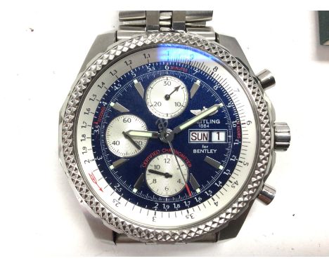 A Breitling Bentley GT automatic wrist watch. Steel case and bracelet. 45mm case with a blue face dial. Seen running. No box 